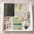 Sage Green Journal Gift Box contents displayed in white box including journal, pens, stickers, keychains and accessories
