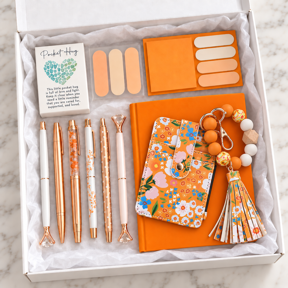 Orange Butterfly Stationery Gift Box – orange hardcover notebook, floral butterfly pencil pouch, rose-gold and white decorative pens, sticky note sets, and pocket hug keepsake arranged in white gift box