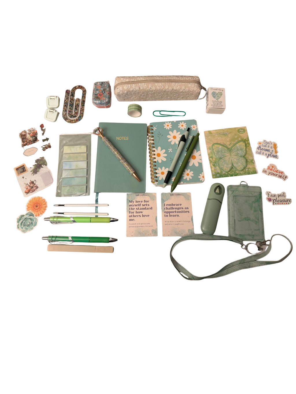 Sage-green stationery and organization gift set flat lay showing all items including journals, pens, lace pouch, rhinestone pen, ID holder, butterfly notepad, encouragement cards and botanical stickers